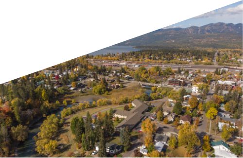 Aerial View of Downtown Whitefish Montana with the lake and big mountain in the background