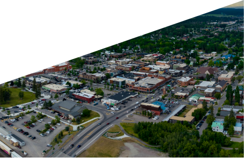 Aerial View of Downtown Whitefish Montana with the lake and big mountain in the background